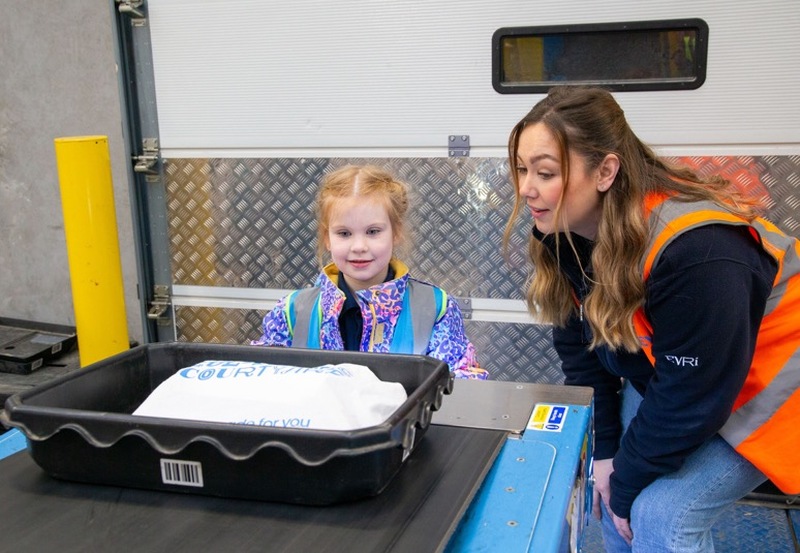 Other image for Pupils get behind-the-scenes look at Evri parcel hub